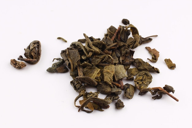 Green tea is dried on a white surface