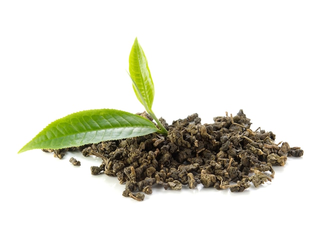 Green tea leaves, dry tea on white background.