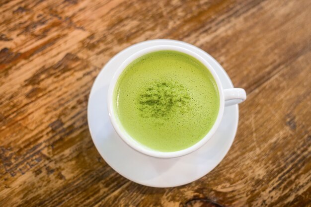 Green tea milk in a cup