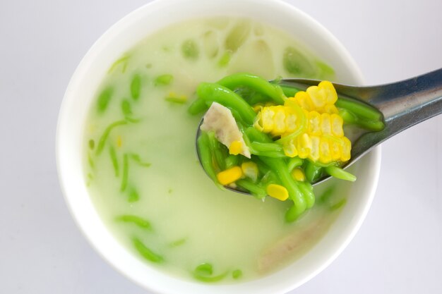 Green thai dumplings in coconut cream and corn