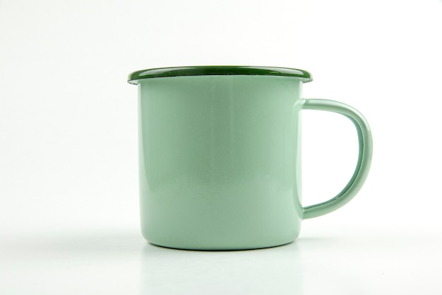 Green tin cup.