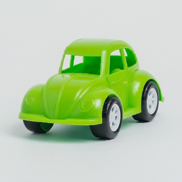 a green toy car with the word quot s quot on the side