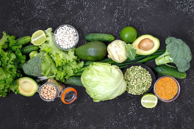 Green vegan food on dark background