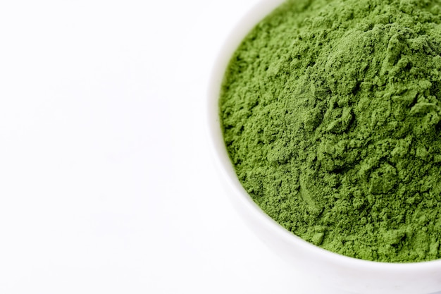 Green vegetables powder texture closeup top view