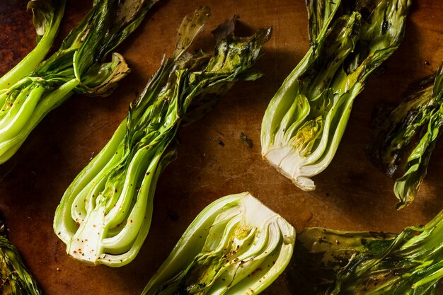 Green vegetables on wooden board