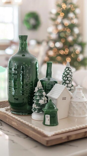 Green and white holiday decorations with a green vase and ornaments