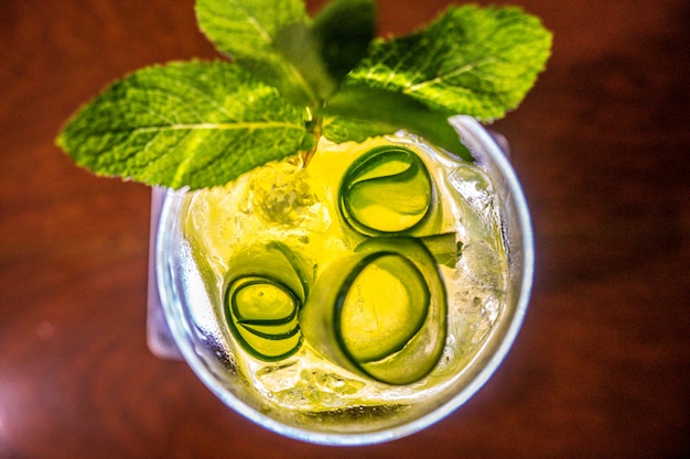 Green and yellow drink with mint and ice