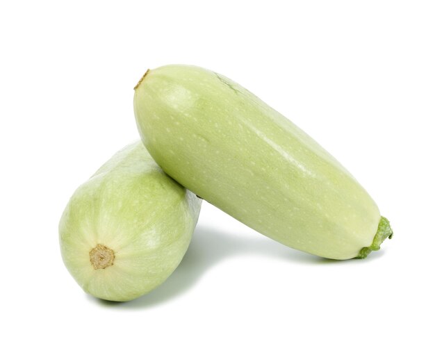 Green zucchini isolated on white background fresh vegetables