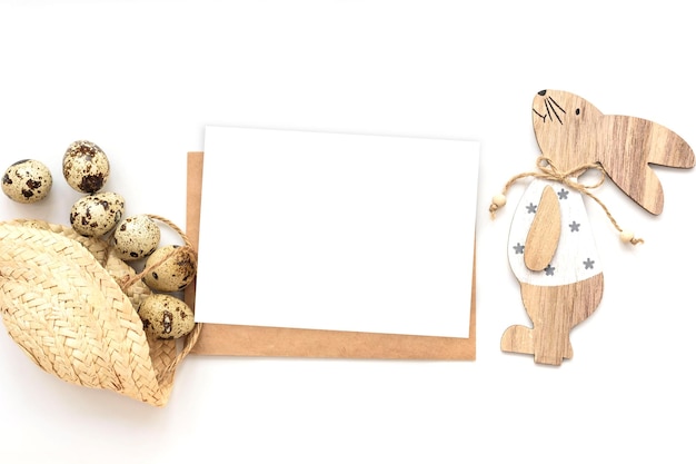 Greeting card easter mockup with wood bunny and easter eggs on white background