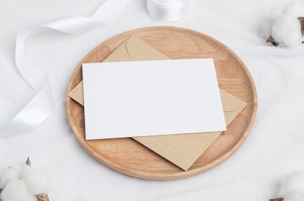 Greeting card mockup with Cotton flower and craft envelop Wedding cards Birthday card Mockup