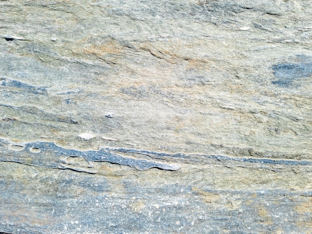 Grey blue stone wall background texture Rocky formation Greek island Cyclades Greece