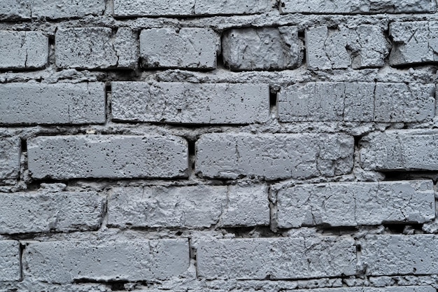 Grey bricked wall texture background wallpaper design