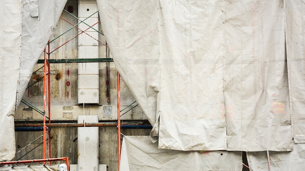 Grey industrial canvas at construction site - background