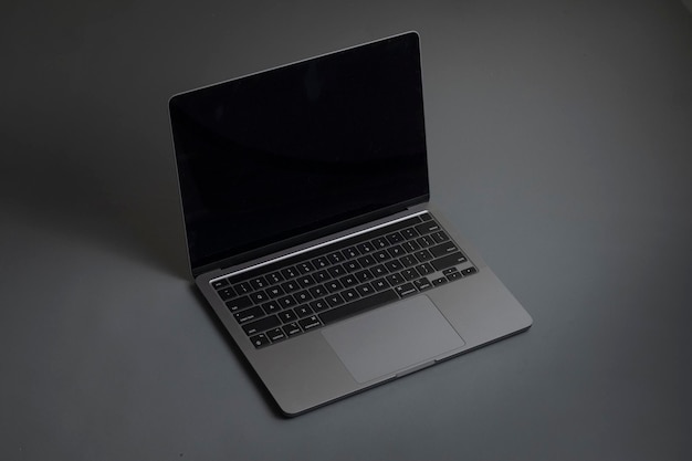 Grey laptop on Grey background