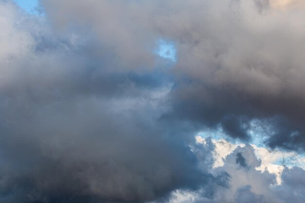 Grey shades storm clouds at evening backdrop