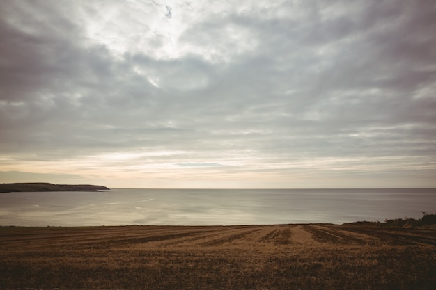 Grey sky over expansive ocean