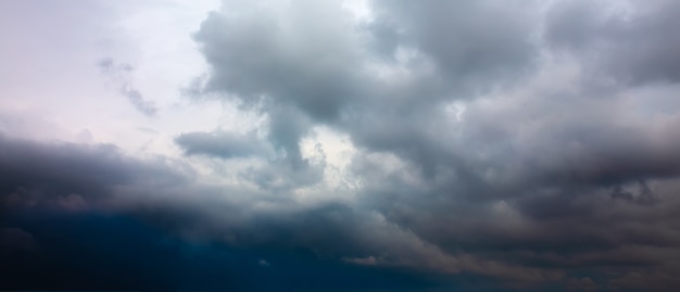 Grey sky with rainy clouds. Dramatic nature.