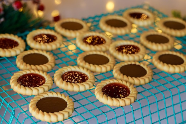 Griddle cooled Christmas cookies with hazelnut spread