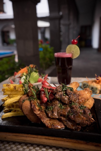 Grill background photography with different cards on a restaurant table