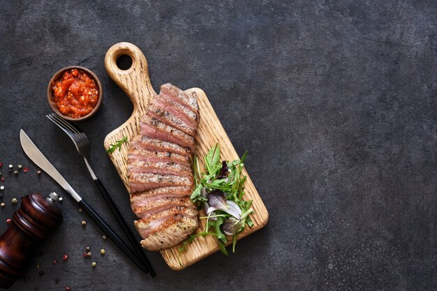 Grilled beef steak medium and mix salad