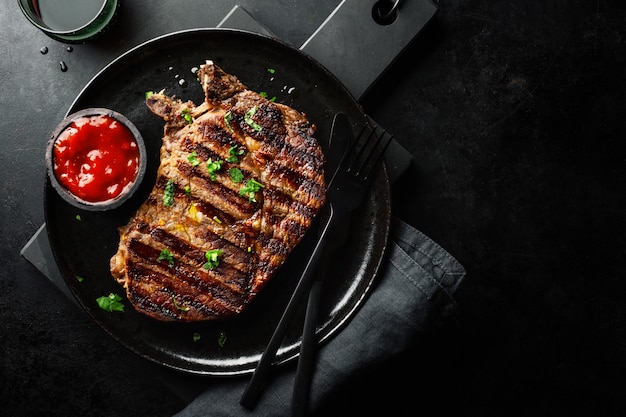 Grilled beef steak served on plate