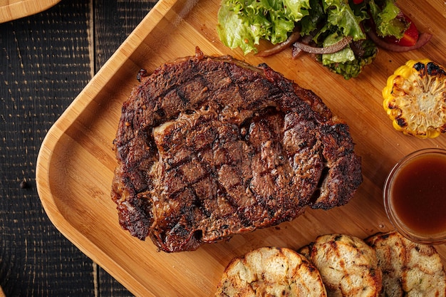 Grilled beef steak set with salad and sauce