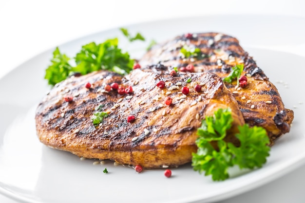 Grilled Chicken Breast with peppercorn parsley and seasame seeds.