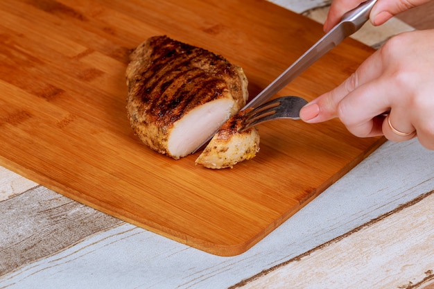 Grilled chicken on a cutting board