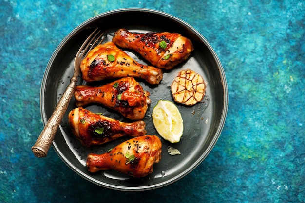 Grilled chicken drumsticks with sesame and soy sauce