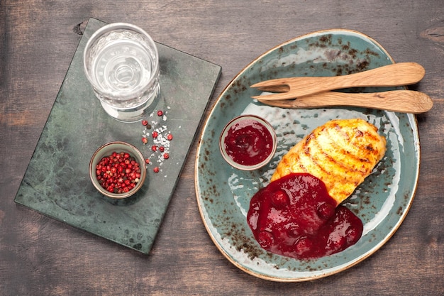 Grilled chicken fillet with cranberry sauce