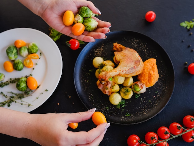 Grilled chicken leg with vegetables recipe concept. cooking process. proper nutrition lifestyle.