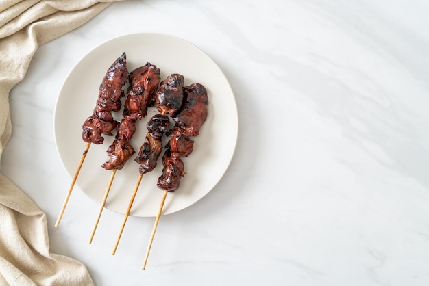 Grilled chicken liver skewer yakitori serve in izakaya style