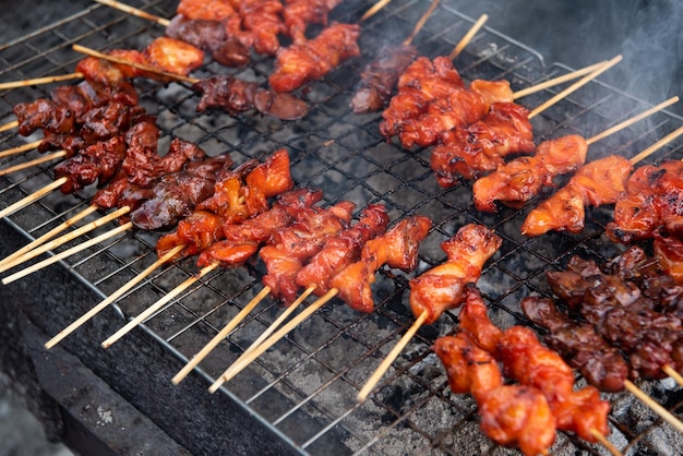 Grilled chicken sauce at Thai street food market