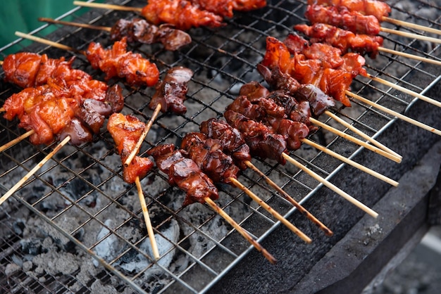 Grilled chicken sauce at Thai street food market