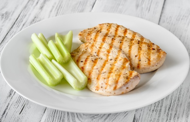 Grilled chicken with celery stalks