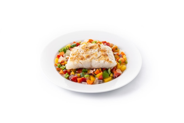 Grilled cod with vegetables isolated on white background