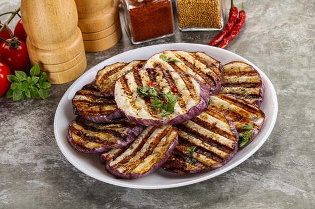 Grilled eggplant slices with cilantro smack