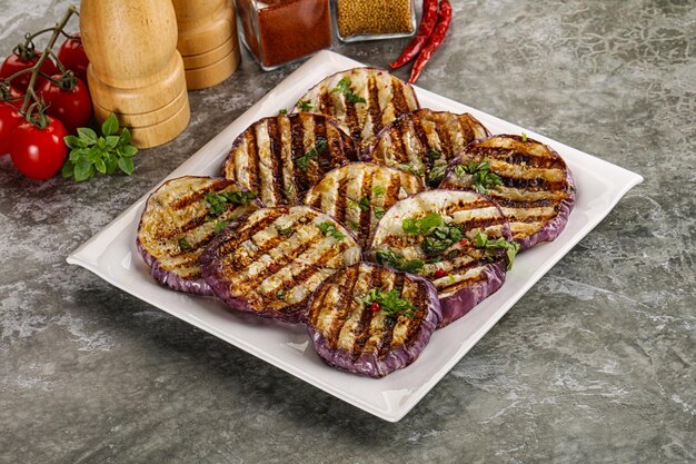 Grilled eggplant slices with cilantro smack