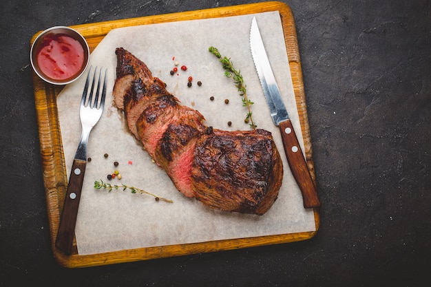 Grilled filet mignon steak, herbs and spices