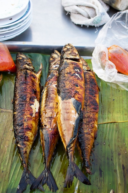 Grilled fish for sell in street food on Thailand market.