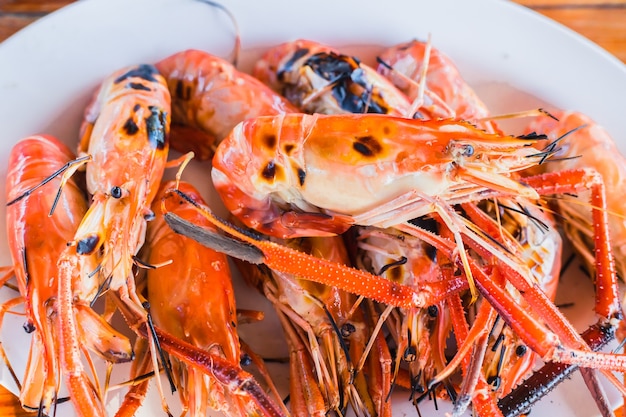 Grilled giant river prawn shrimp bbq food menu popular street seafood in Thailand.