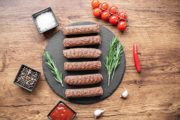 Grilled kebab with spices on a rustic background