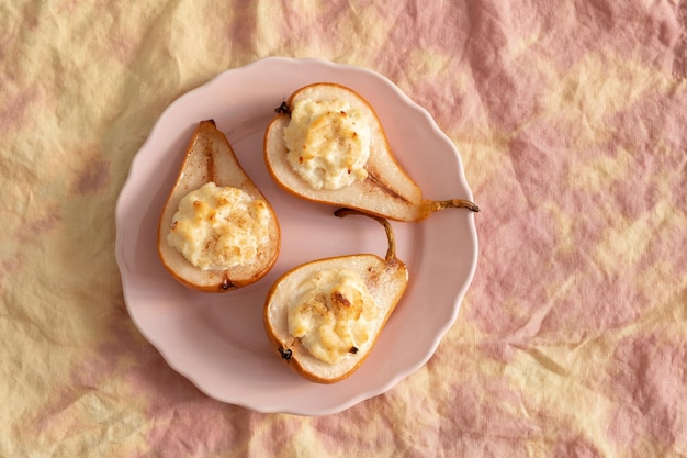 Grilled pears baked with ricotta cheese and walnuts honey topping