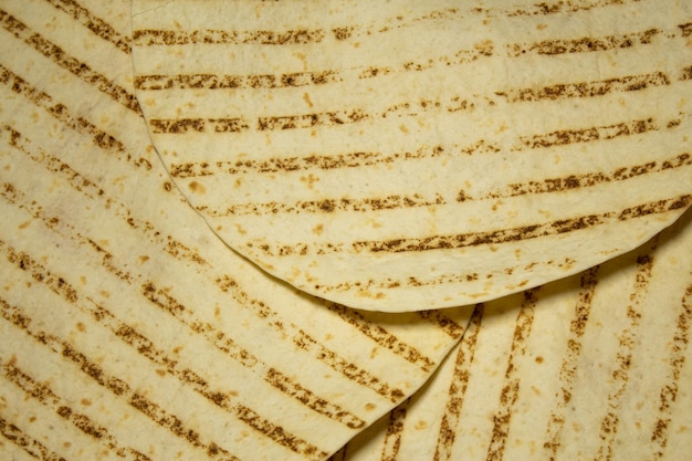 Grilled Pita or tortilla background. Mexican food.