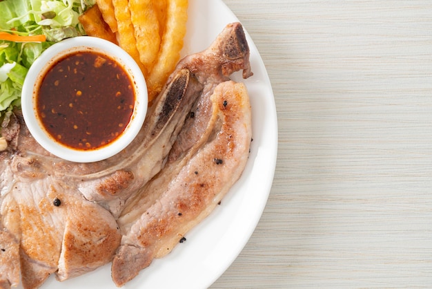 Grilled pork chop steak with Thai spicy dipping sauce