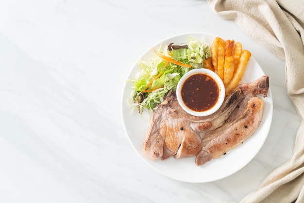 Grilled pork chop steak with Thai spicy dipping sauce