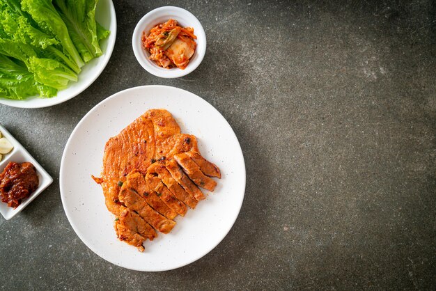 grilled pork marinated Kochujang sauce in Korean style with vegetable and kimchi - Korean food style