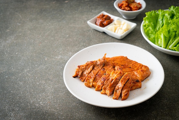 grilled pork marinated Kochujang sauce in Korean style with vegetable and kimchi - Korean food style