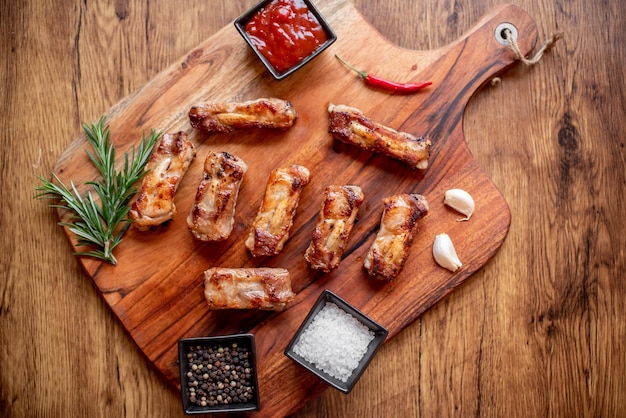 grilled pork ribs on wooden background