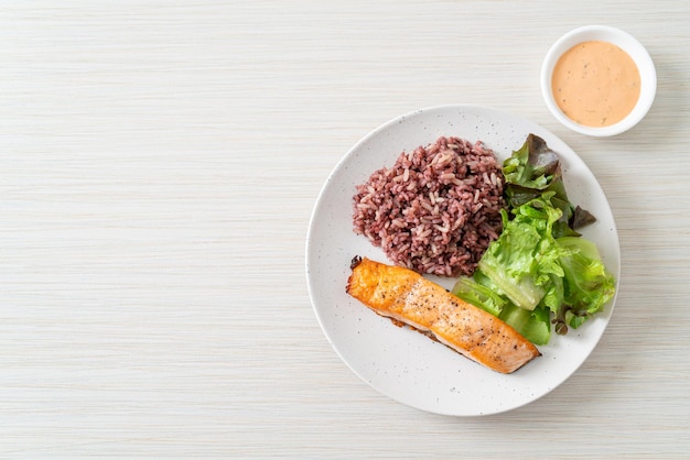 Grilled salmon fillet steak with rice berry and vegetable